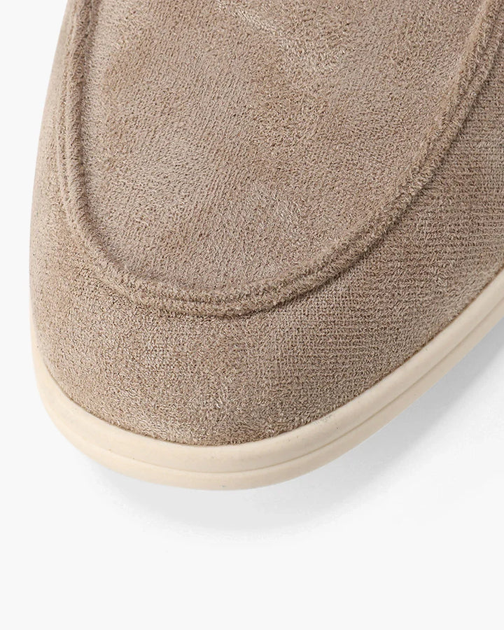 Stylish men's beige slip-on moccasins, designed for ultimate comfort & easy wear. A versatile fashion choice.