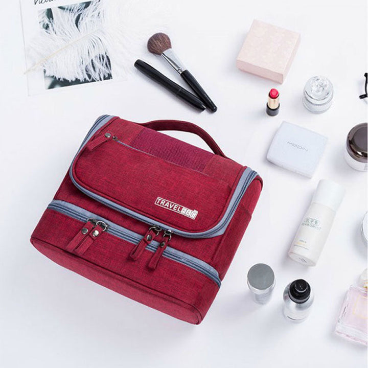 Large unisex hanging toiletry bag with various compartments, perfect travel cosmetic & bathroom organizer.