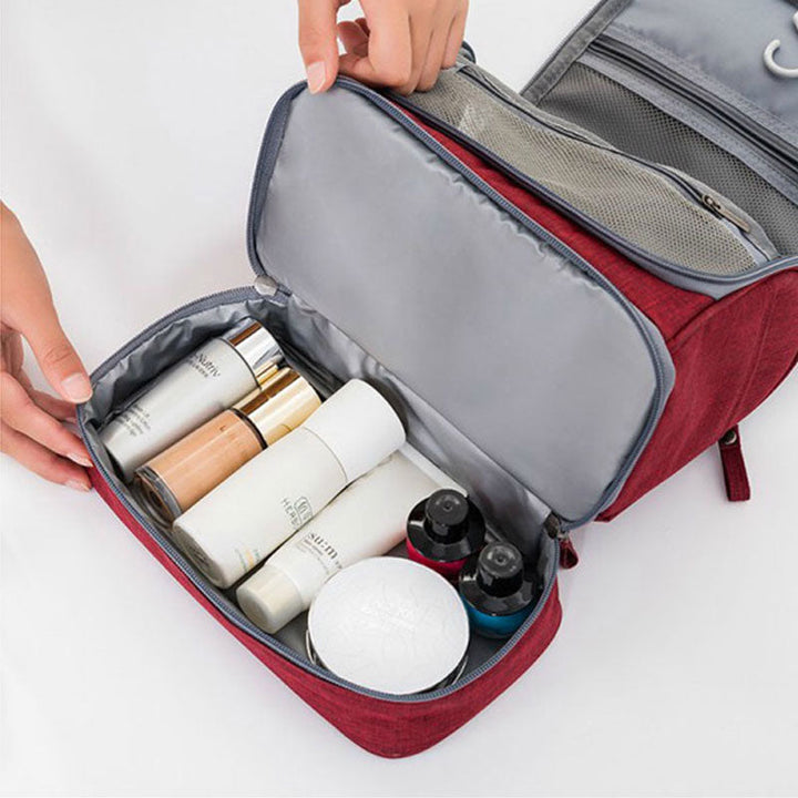 Water-resistant, multi-compartment hanging toiletry travel bag for men & women, excellent for organizing.