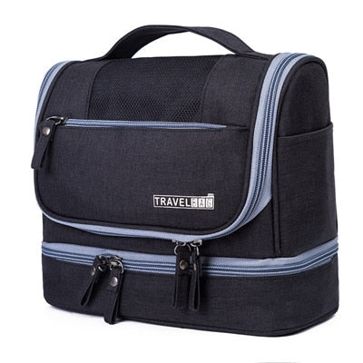 Hanging travel toiletry bag for men & women, features multiple compartments & water-resistant design for trips.