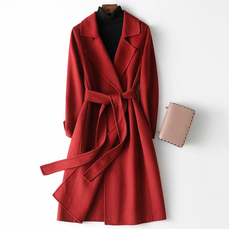 Elegant women's burgundy belted wrap coat, perfect for fall/winter. Flattering A-line design & chic outerwear.