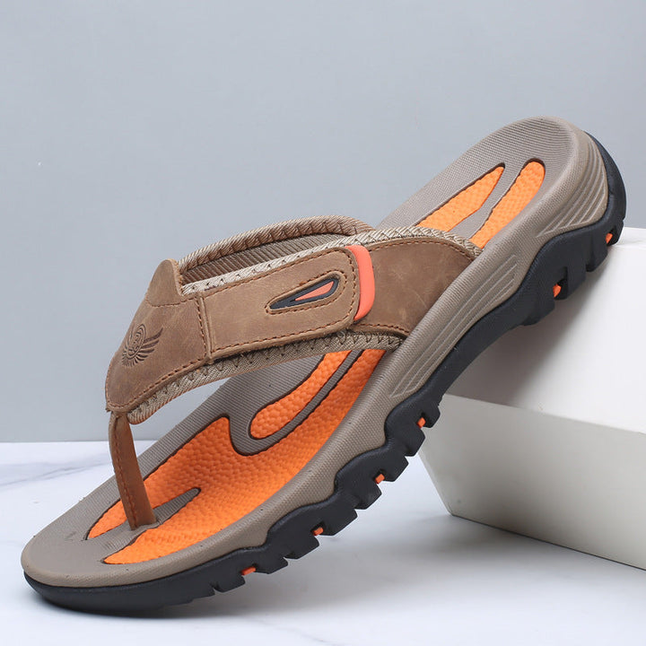 Comfortable men's toe post sandals with supportive sole, perfect for casual, everyday slip-on use. Stylish black.
