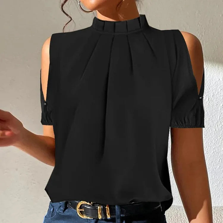 Elegant black pleated women's top. Ideal for workwear, office fashion, or a stylish casual look. Comfortable & versatile.