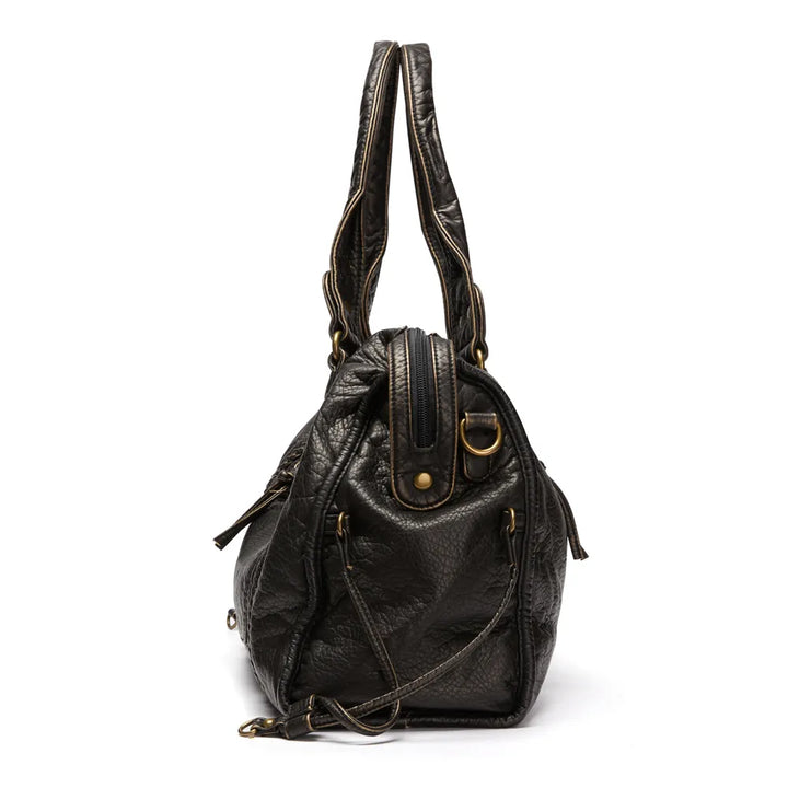 Sophisticated black women's work handbag with organized compartments for school and daily essentials.