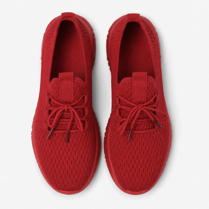 Red flexible women's flats, comfortable and perfect for everyday casual wear.