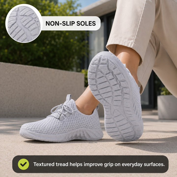 Black slip-resistant women's flats, comfortable for everyday walking.
