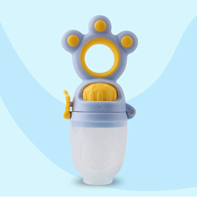 Happy baby chewing on a soft silicone teether for comfortable gum relief. BPA-free design.