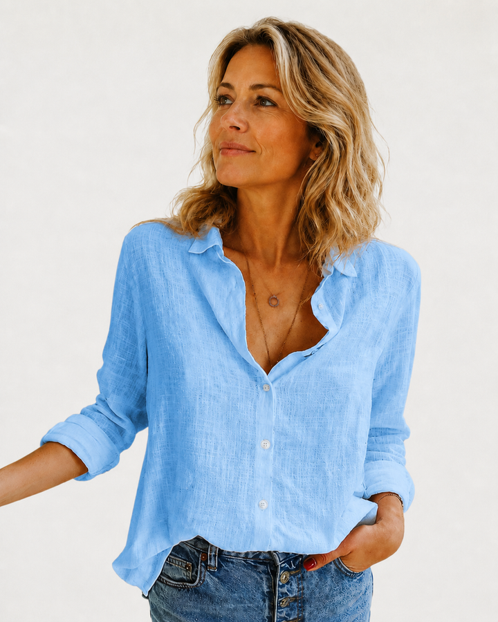 Stylish women's button-down long sleeve top, a versatile collared blouse for various occasions and fashion needs.