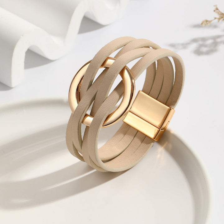 Beige bohemian double circle leather bracelet for women. Stylish, adjustable accessory, versatile fashion.