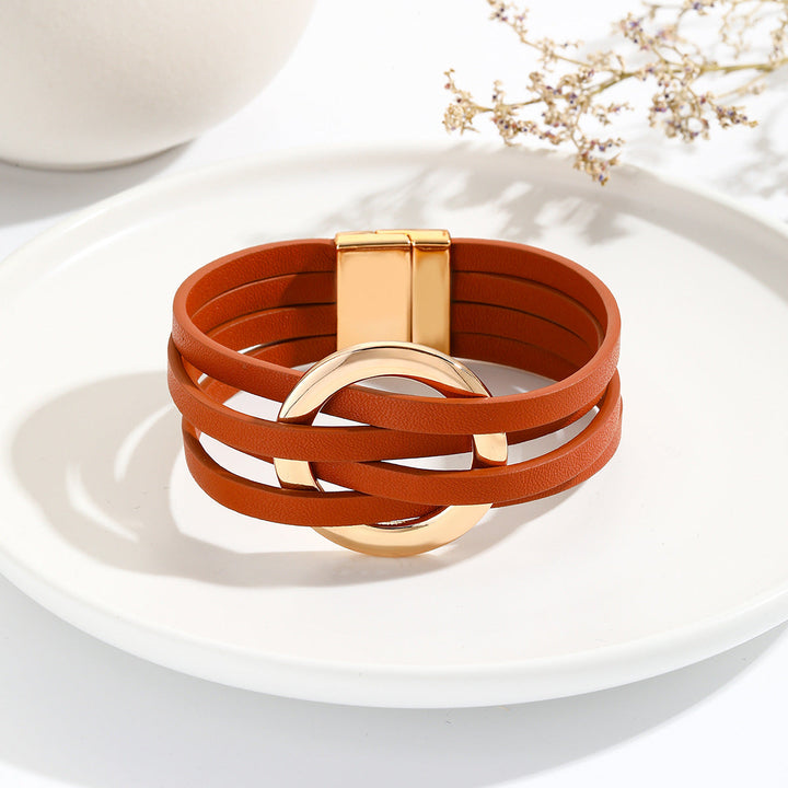 Blue bohemian double circle leather bracelet. Versatile, adjustable women's fashion jewelry accessory.