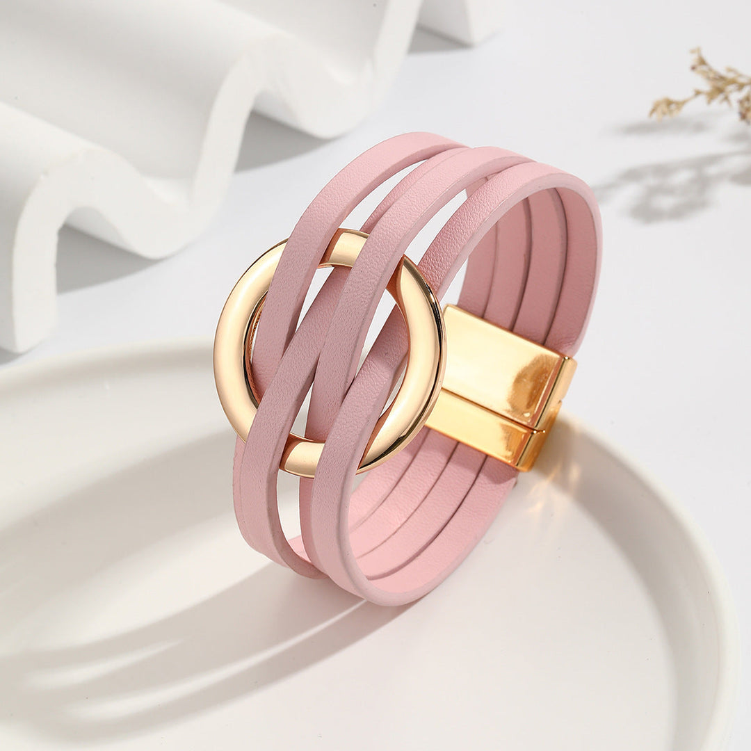 Women's bohemian double circle leather bracelet. Adjustable, versatile fashion jewelry accessory.