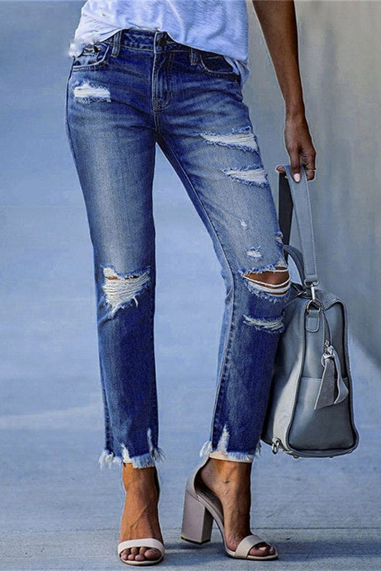 Comfortable women's straight leg jeans with trendy rips & a raw hem, great for casual fashion.