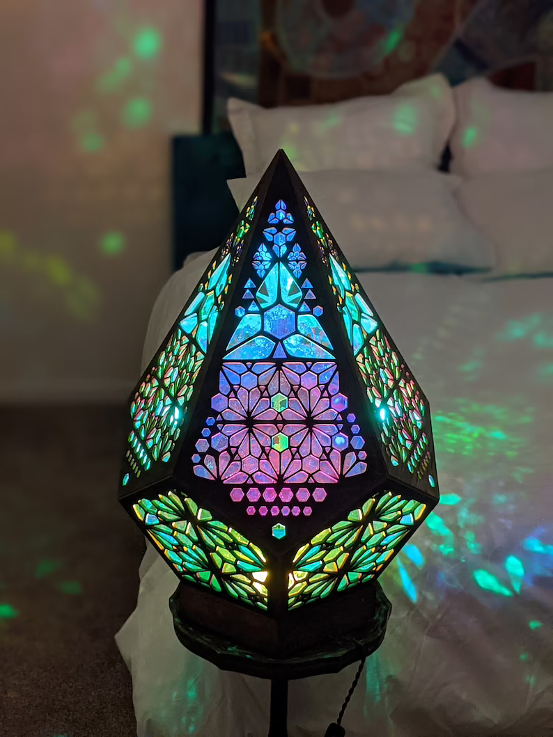 Boho StarGroove lamp, a wooden decorative light projecting captivating star patterns for ambient mood.