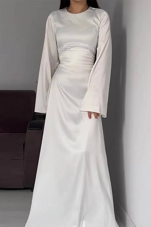Elegant women's long party dress with flared sleeves, perfect for gala events.