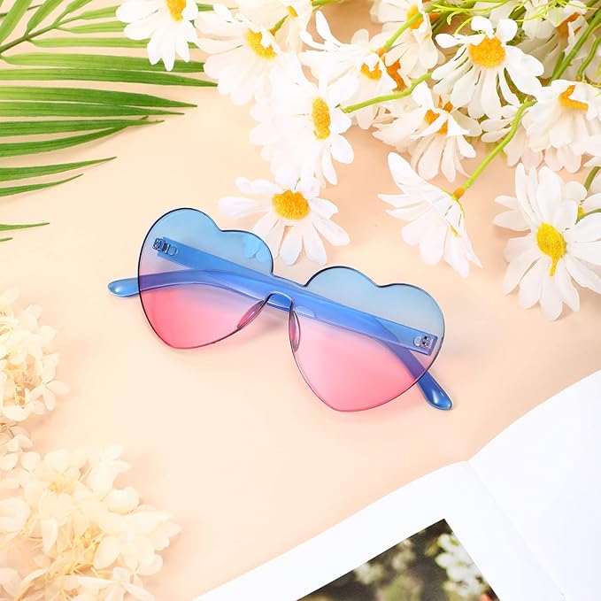 Women's lightweight heart-shaped transparent sunglasses, ideal for summer and parties.
