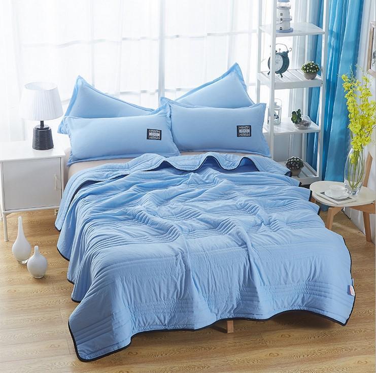 Summer essential: Ultra-soft, breathable cooling blanket. Lightweight bamboo & cotton blend ensures comfortable sleep in hot weather.
