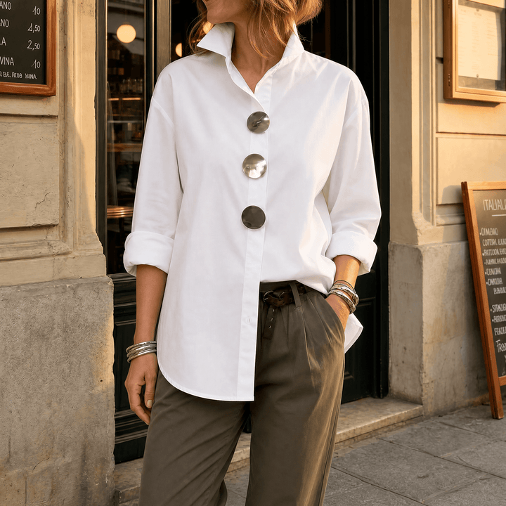 Everyday fashion women's oversized shirt, relaxed fit, stylish statement buttons for a chic look.