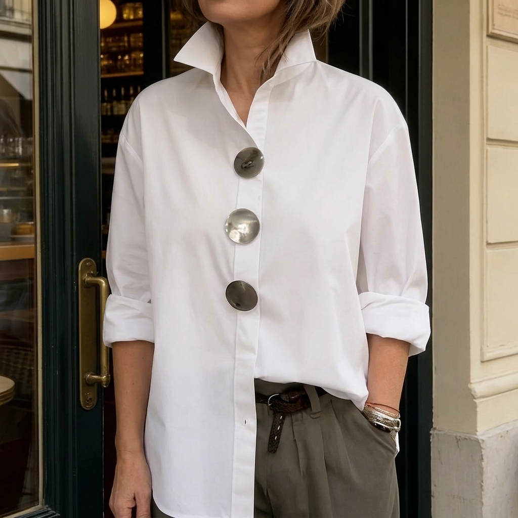 Elegant oversized women's blouse, long sleeve, with eye-catching statement buttons, everyday wear.