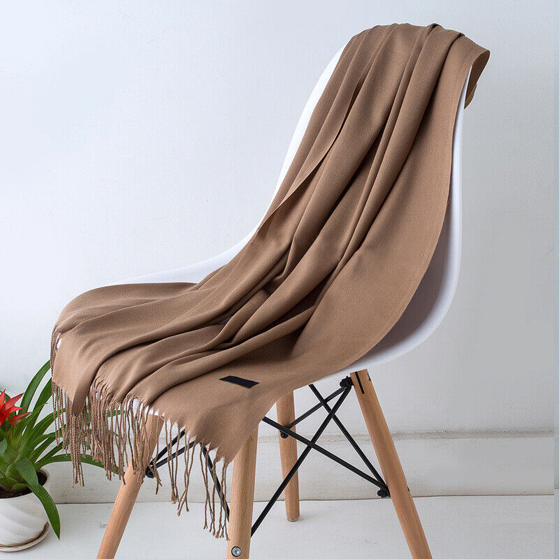 Luxurious feel Bria women's cashmere scarf with stylish drape. Soft, warm, perfect for winter outfits.