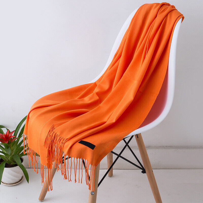 Cozy, high-quality Bria women's cashmere scarf. An elegant, soft, and warm luxury winter accessory.