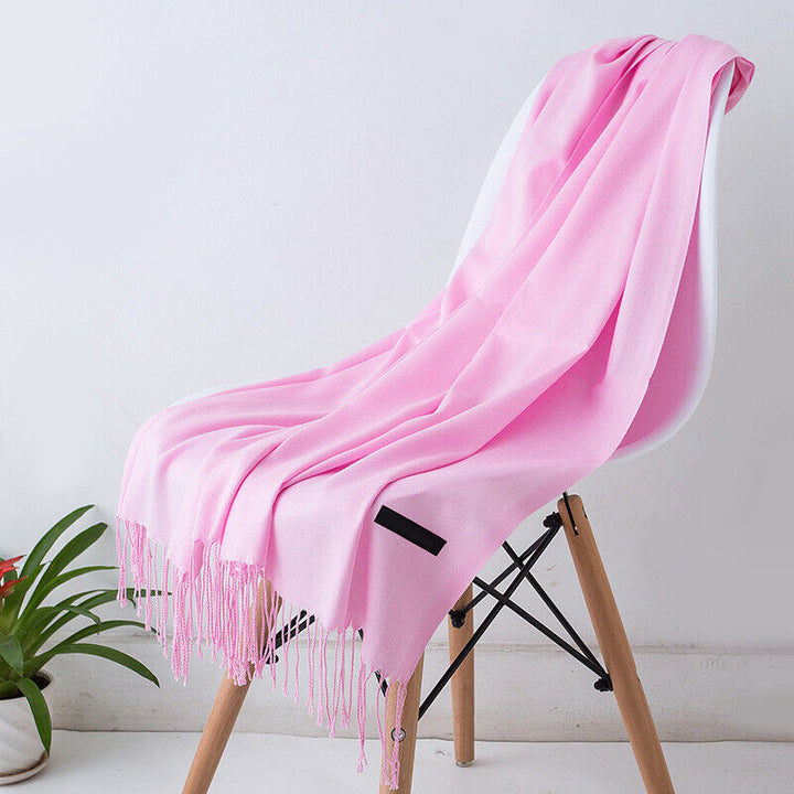 Elegant solid color Bria cashmere scarf for women. A luxurious, soft accessory for winter style.