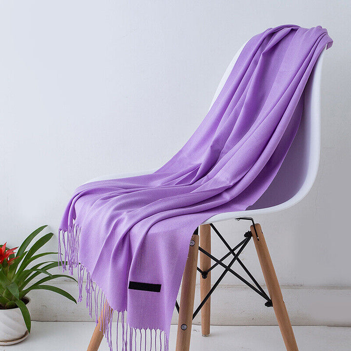 Long & stylish Bria women's cashmere wrap. Soft, warm, and a luxurious accessory for any outfit.