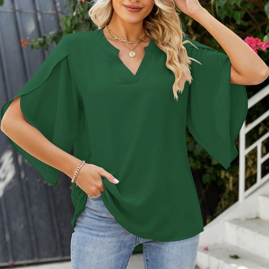 Versatile women's V-neck blouse with split sleeves, suitable for casual outings or office attire.