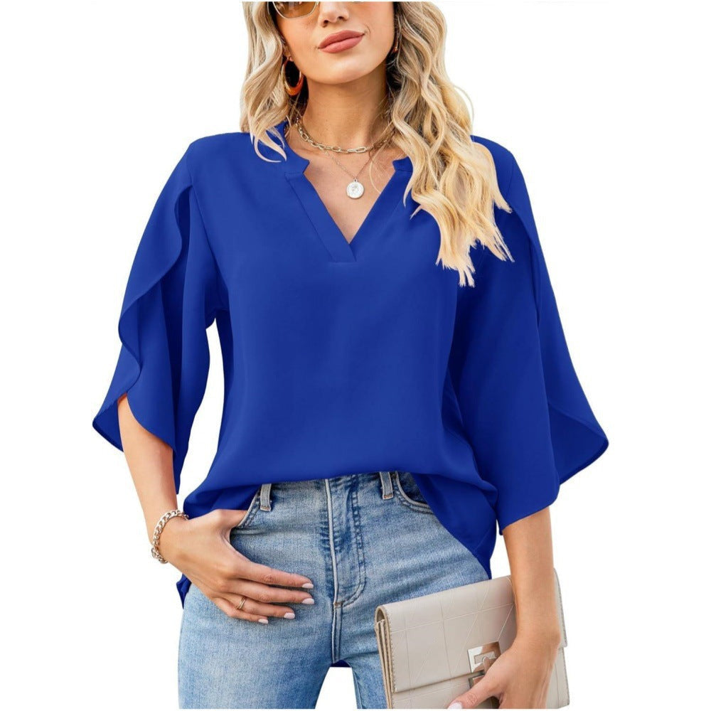 Professional women's work blouse: Brielle V-neck top with elegant split sleeves for office wear.