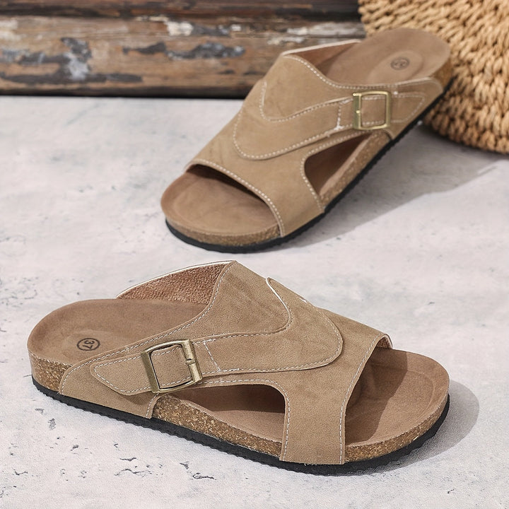 Casual women's Brindelle flat sandals with an adjustable ankle strap for perfect summer style.