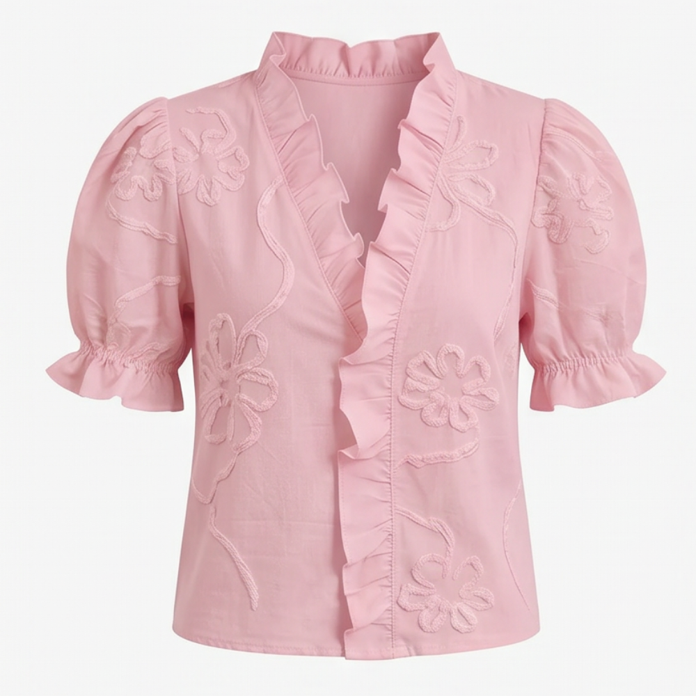 Chic women's V-neck top, floral embroidered design, comfortable puff sleeves.