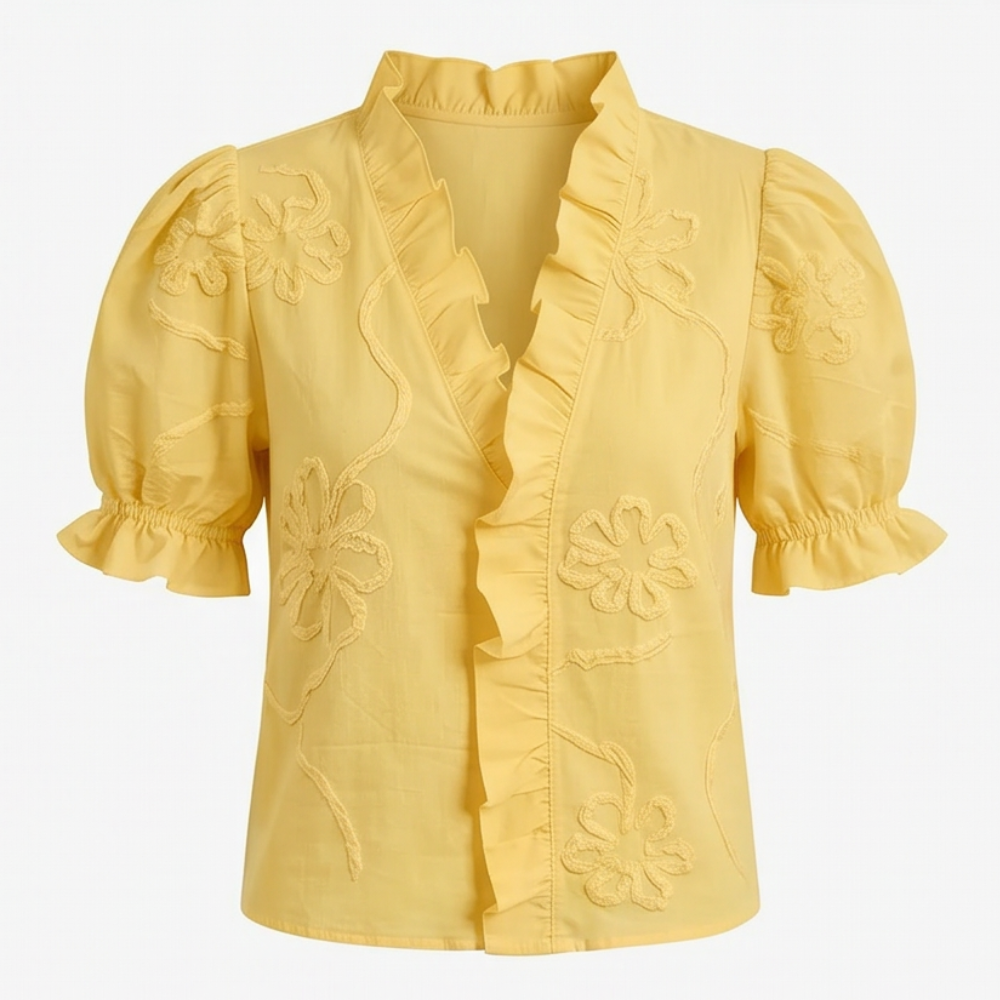 Stylish women's floral embroidered puff sleeve blouse, versatile for any outfit.
