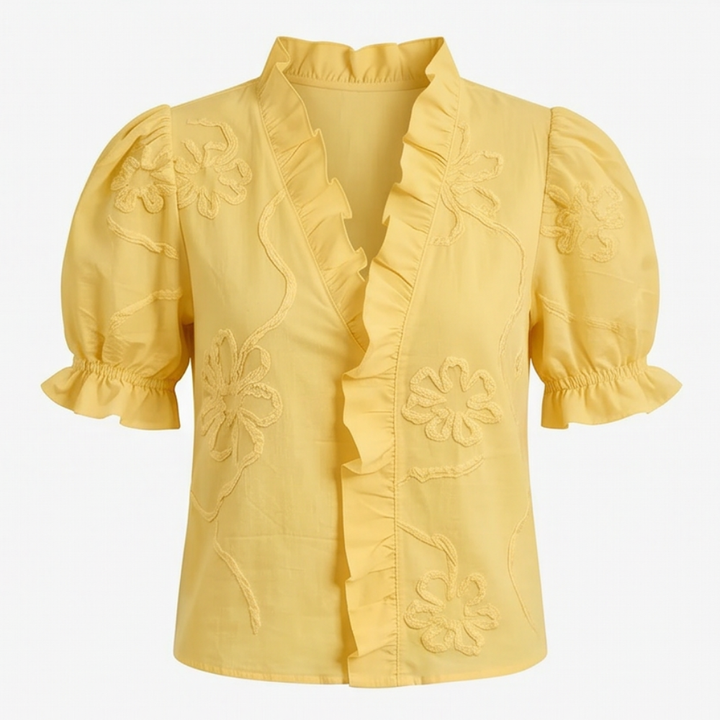 Stylish women's floral embroidered puff sleeve blouse, versatile for any outfit.