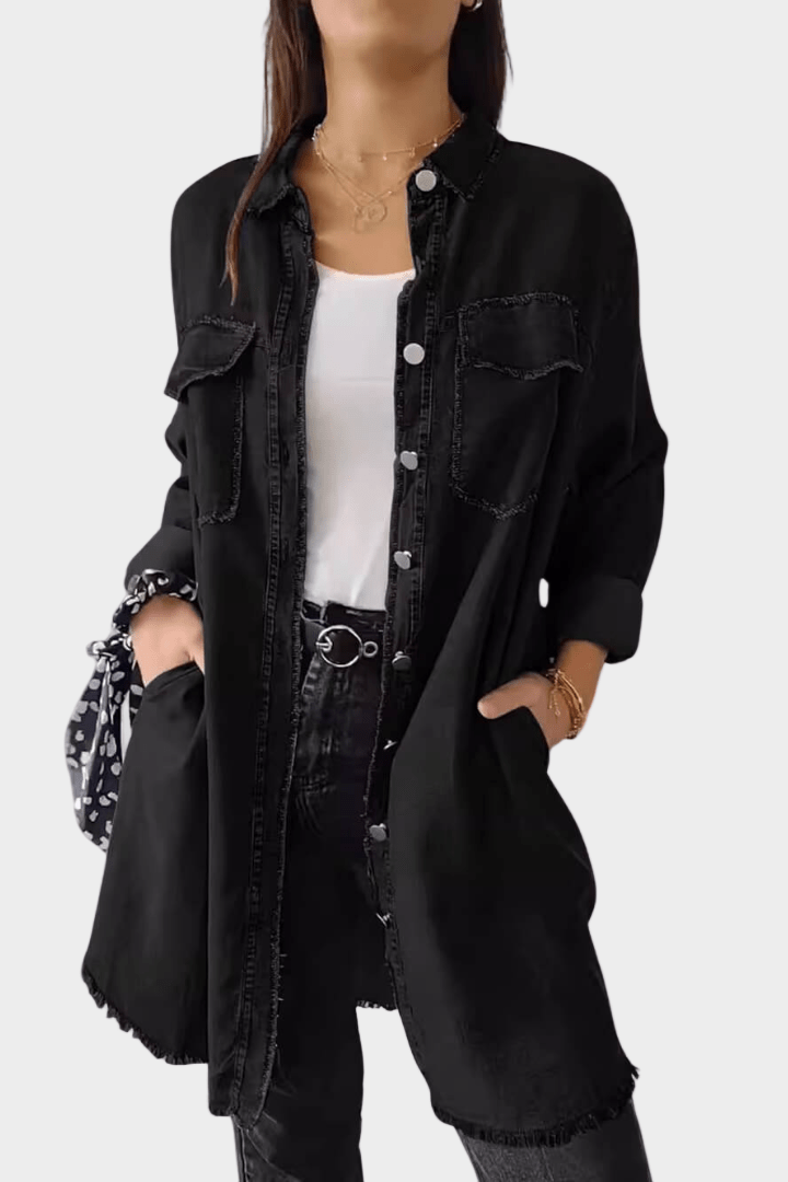 Comfortable women's oversized mini shirt dress with a casual button front, great for relaxed fall fashion.