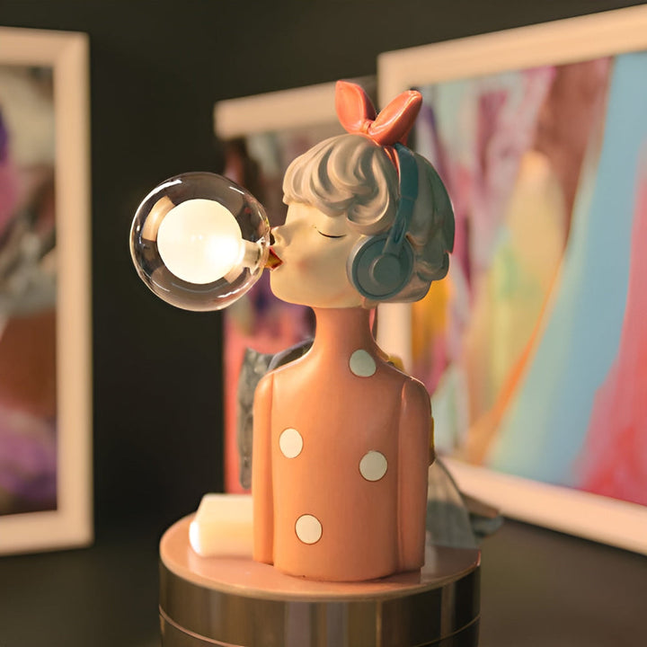 Graceful fairy figurine LED table lamp, providing a soft, magical glow for kids' whimsical room decor.