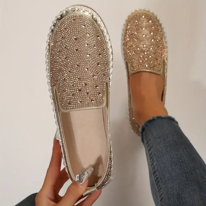 Fashionable women's rhinestone glitter slip-on shoes, combining comfort with sparkle.