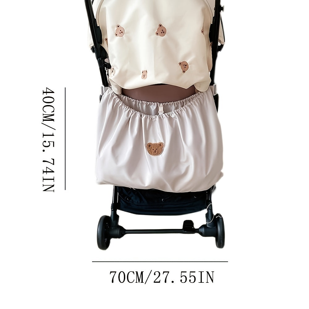 Pushchair organizer bag with large storage for diapers, bottles & baby accessories. Adjustable universal fit.