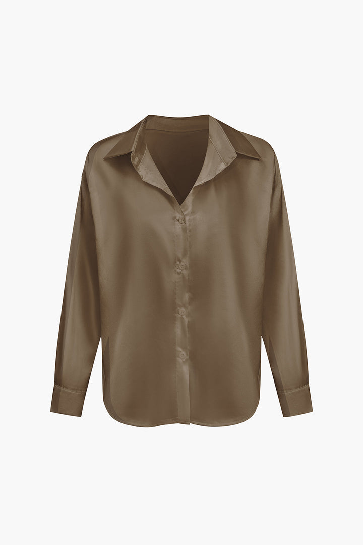 Refined women's long-sleeve button-front blouse, perfect for ladies.