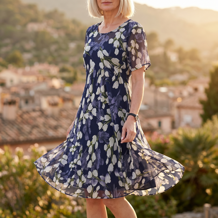Women's Calanthe navy floral midi dress, short sleeve, elegant for occasion wear & summer events.