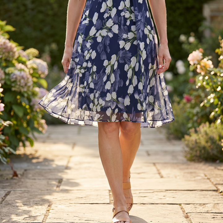Stylish women's navy floral midi dress, flowy short sleeve, an elegant party & occasion wear piece.
