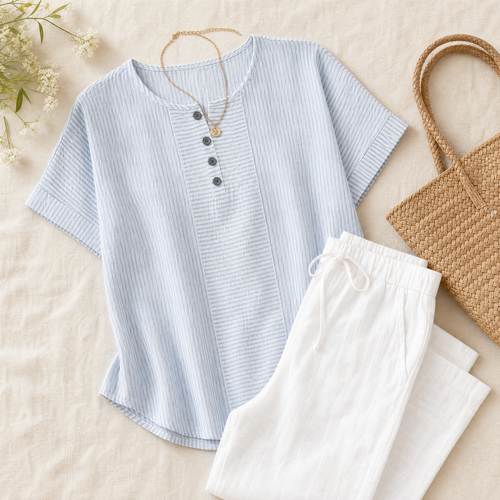 Everyday women's fashion: striped henley top with button placket, great for casual spring outfits.