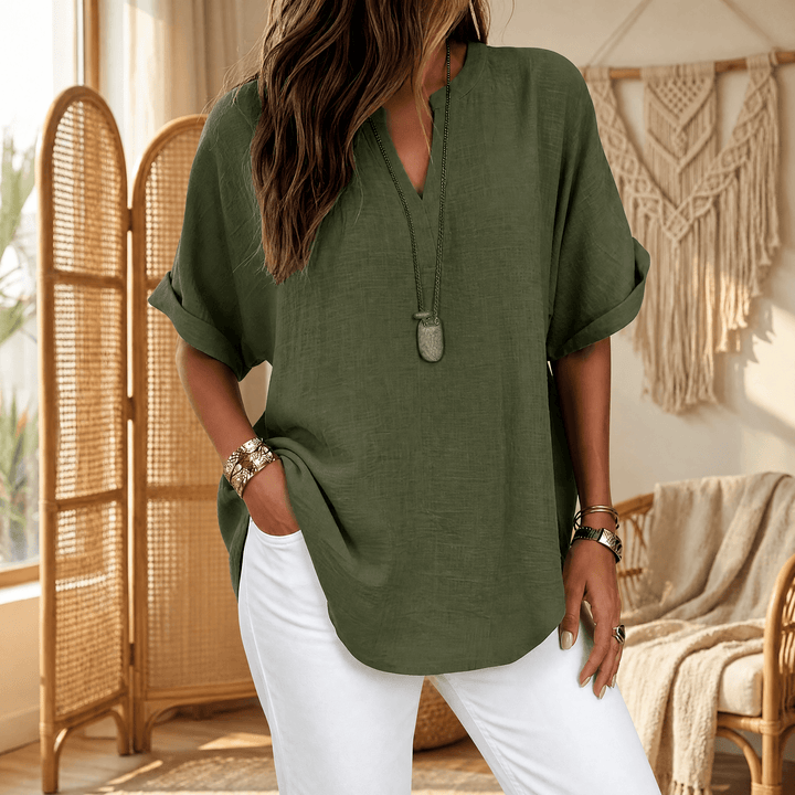 Women's everyday V-neck blouse. Relaxed fit, short sleeve, comfortable and flattering.