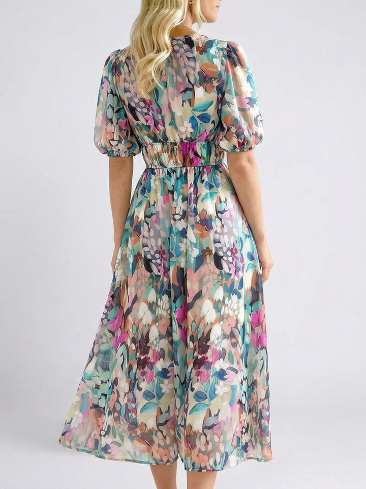 Printed floral midi dress for women featuring a stylish V-neck and comfortable short sleeves for spring fashion.