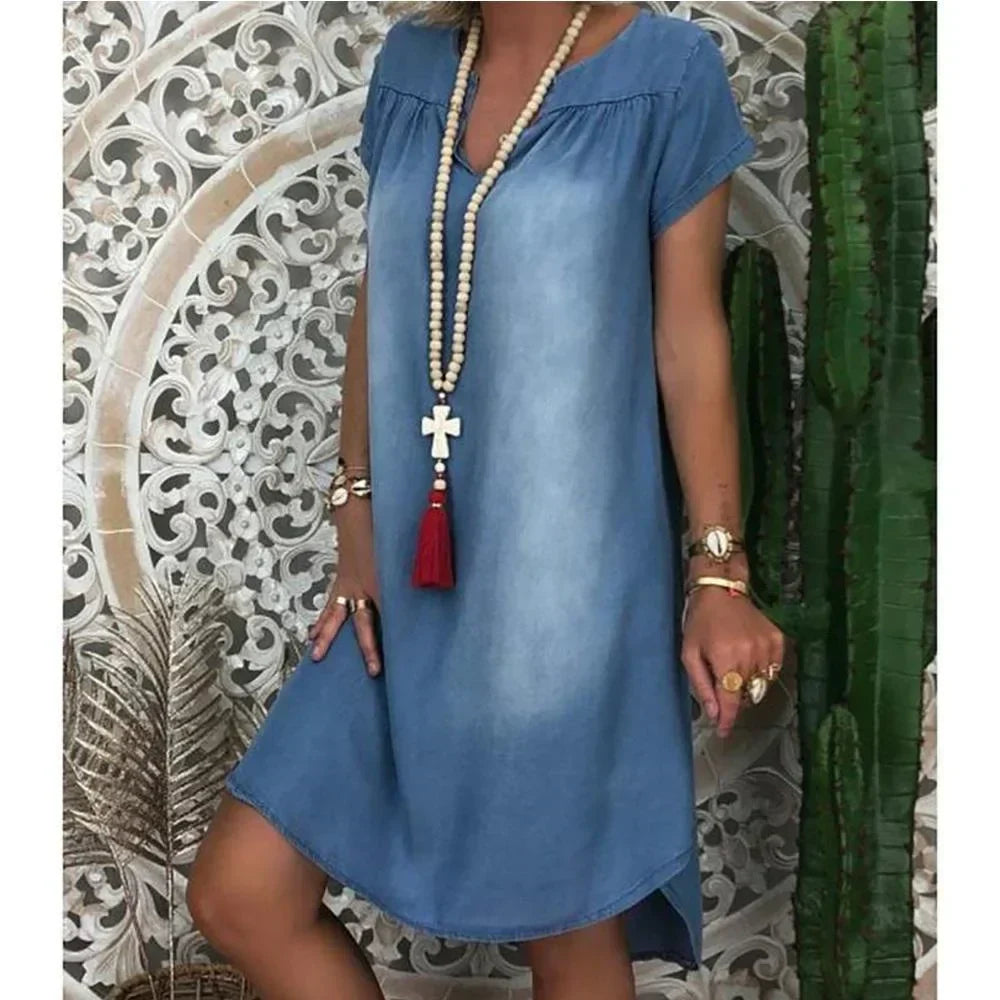Plus size blue relaxed fit summer midi dress, V-neck & short sleeves. Women's casual and comfortable everyday wear.