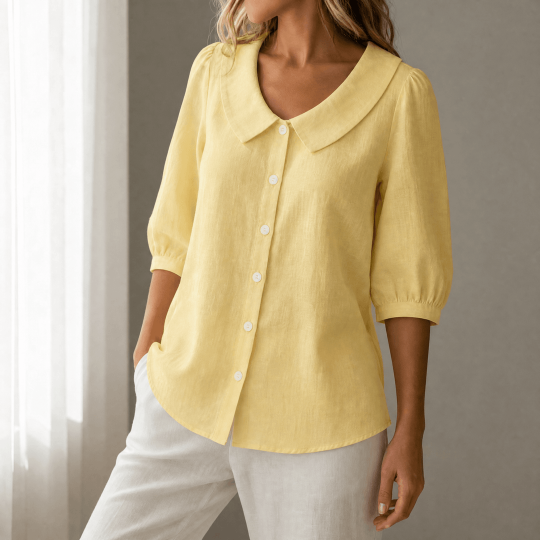 Feminine spring fashion blouse with Peter Pan collar & comfortable relaxed fit.