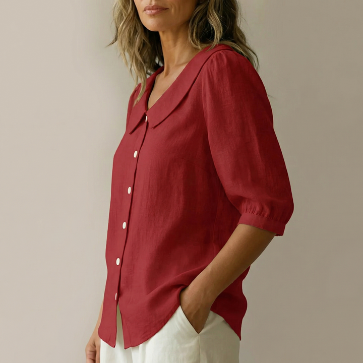 Feminine Peter Pan collar blouse, relaxed fit for casual chic style.