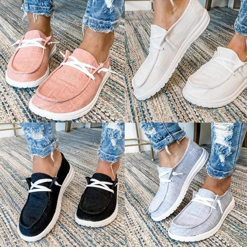 Woman wearing comfortable bunion slip-on flats, ideal for all-day walking & foot support.