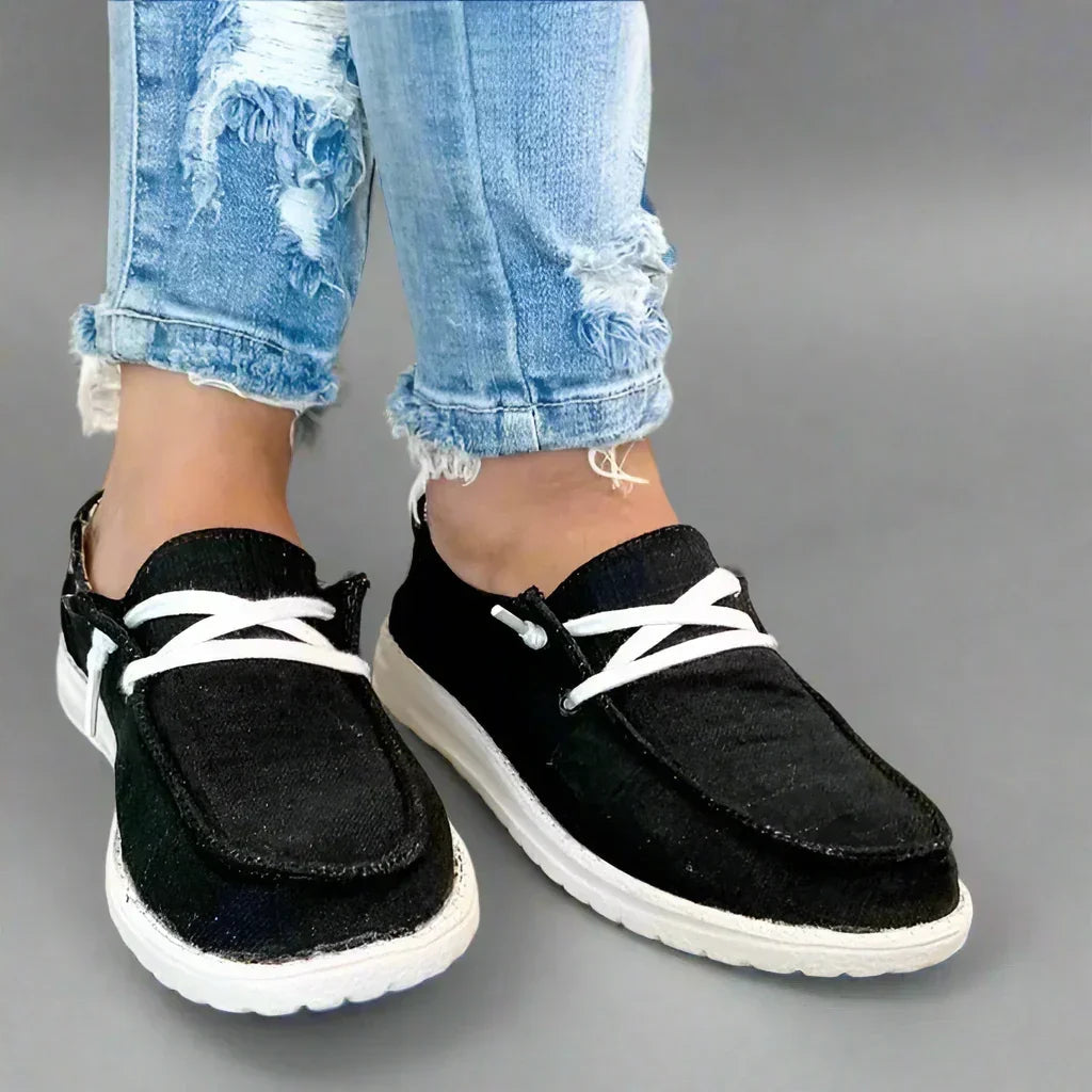 Pair of women's bunion comfort flats, wide toe box, perfect for daily foot support & pain relief.