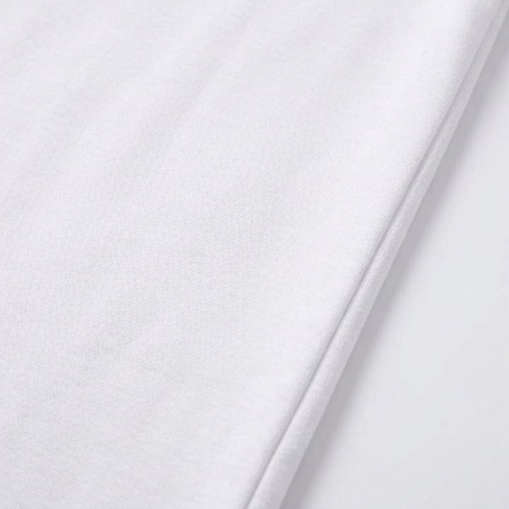 Female V-neck top with short sleeves & smart rolled cuffs, a comfortable fashion basic.
