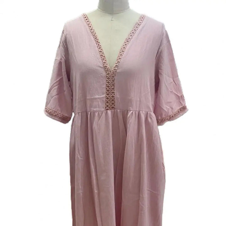 Stylish plus size women's midi dress for summer. Comfortable, elegant, and versatile casual event wear with short sleeves.