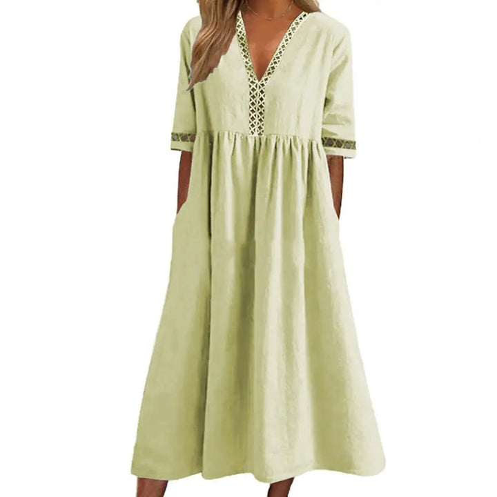 Effortlessly elegant plus size midi dress. Women's comfortable, loose fit short sleeve for casual summer fashion.